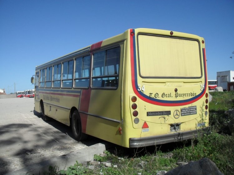 Mercedes-Benz OF 1418 - La Favorita - T.O. General Pueyrredón
Coche que nace como interno 78 en Septiembre de 2008, cuando "T.O. 25 de Mayo" se hace cargo de T.O.G.P. y agranda la flota. Es renumerado como coche 34 durante 2009, y luego repintado con el corte de "25 de Mayo". Finalmente, dado de baja en Enero de 2013 es entregado a Colcam, que lo vende a "Transporte La Posta"
