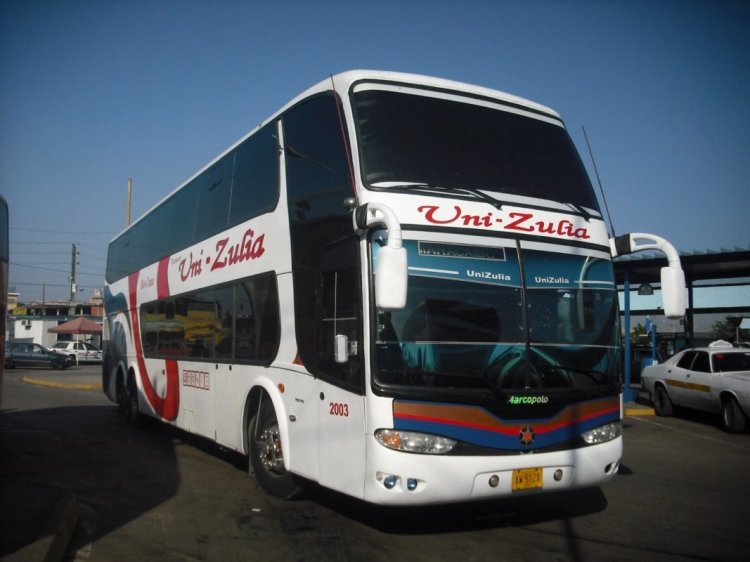 Volvo B12R - Marcopolo Paradiso G6 1800DD (en Venezuela) - Transportes Uni-Zulia 2003
AW512X.
Ex.203 de Expresos San Cristóbal. Llegando de Caracas. Con los retrovisores que suelen colocarles a los Marcopolo que exportan a África. En ésta misma unidad viajé mas tarde ese día de vuelta a Caracas.
Palabras clave: Marcopolo Paradiso G6 1800DD Volvo