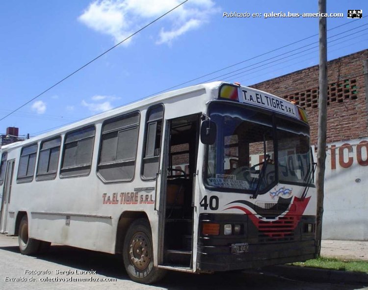 Mercedes-Benz OF 1214 - El Trapiche - El Tigre
TOD 043 - ex patente M.269380
[url=https://bus-america.com/galeria/displayimage.php?pid=62706]https://bus-america.com/galeria/displayimage.php?pid=62706[/url]
[url=https://bus-america.com/galeria/displayimage.php?pid=62708]https://bus-america.com/galeria/displayimage.php?pid=62708[/url]
[url=https://bus-america.com/galeria/displayimage.php?pid=62709]https://bus-america.com/galeria/displayimage.php?pid=62709[/url]
[url=https://bus-america.com/galeria/displayimage.php?pid=62710]https://bus-america.com/galeria/displayimage.php?pid=62710[/url]
[url=https://bus-america.com/galeria/displayimage.php?pid=62711]https://bus-america.com/galeria/displayimage.php?pid=62711[/url]
[url=https://bus-america.com/galeria/displayimage.php?pid=62712]https://bus-america.com/galeria/displayimage.php?pid=62712[/url]

El Tigre (Prov. Tucumán), interno 40
Ex línea 122 (Prov. Tucumán), interno 40 [2006-2007]
Ex líneas 40 (Mendoza), interno 45 [1991-2006]
Ex línea 4 (Mendoza), interno 45 [1990-1991]

Fotografía: Sergio Lacroix
Extraído de: www.colectivosdemendoza.com.ar

Para conocer la historia completa de esta carrocería haga click en: 
[url=https://www.bus-america.com/ARcarrocerias/ElTrapiche/ElTrapiche-histo.php]EL TRAPICHE,  historia de sus carrocerías[/url]
