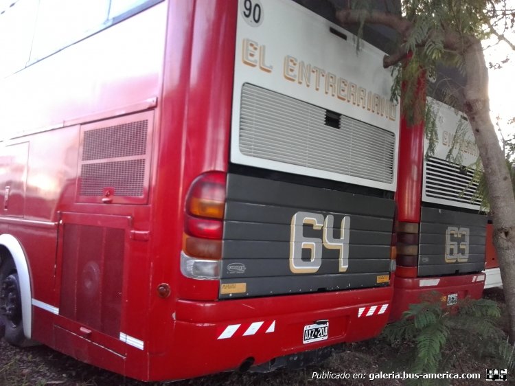 Scania K 113 - Marcopolo Paradiso 1800 DD GV (en Argentina) - El Entrerriano
El Entrerriano (Basa Hermanos S.A.)
Internos 64 (Izquierda) - 63 (Derecha)
AXZ204 (Izquierda) - AXZ203 (Derecha)
El interno 64 se encuentra modificado con componentes de G6, mientras el 63 se mantiene completamente original.
Foto 1 (Ext.): [url=https://bus-america.com/galeria/displayimage.php?pid=49443]https://bus-america.com/galeria/displayimage.php?pid=49443[/url]
Foto 2 (Ext.): [url=https://bus-america.com/galeria/displayimage.php?pid=49444]https://bus-america.com/galeria/displayimage.php?pid=49444[/url]
Foto 3 (Ext.): Foto actual
Foto 4 (Ext.): [url=https://bus-america.com/galeria/displayimage.php?pid=49445]https://bus-america.com/galeria/displayimage.php?pid=49445[/url]
Foto 5 (Cabina): [url=https://bus-america.com/galeria/displayimage.php?pid=49446]https://bus-america.com/galeria/displayimage.php?pid=49446[/url]
Foto 6 (Cabina): [url=https://bus-america.com/galeria/displayimage.php?pid=49447]https://bus-america.com/galeria/displayimage.php?pid=49447[/url]
Foto 7 (Cabina): [url=https://bus-america.com/galeria/displayimage.php?pid=49448]https://bus-america.com/galeria/displayimage.php?pid=49448[/url]
Foto 8 (Interior): [url=https://bus-america.com/galeria/displayimage.php?pid=49449]https://bus-america.com/galeria/displayimage.php?pid=49449[/url]
Foto 9 (Interior): [url=https://bus-america.com/galeria/displayimage.php?pid=49450]https://bus-america.com/galeria/displayimage.php?pid=49450[/url]
Foto 10 (Interior): [url=https://bus-america.com/galeria/displayimage.php?pid=49451]https://bus-america.com/galeria/displayimage.php?pid=49451[/url]
Foto 11 (Interior): [url=https://bus-america.com/galeria/displayimage.php?pid=49452]https://bus-america.com/galeria/displayimage.php?pid=49452[/url]
Foto 12 (Interior): [url=https://bus-america.com/galeria/displayimage.php?pid=49453]https://bus-america.com/galeria/displayimage.php?pid=49453[/url]
Palabras clave: Scania K113 El Entrerriano Basa Marcopolo Original Reformado
